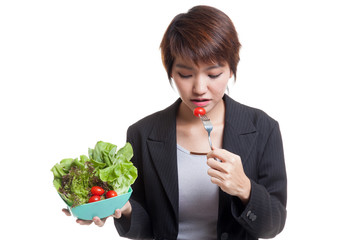 Healthy Asian business woman with salad.