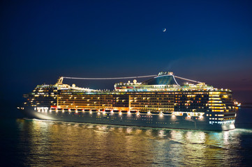 Fototapeta na wymiar Cruise liner and new moon