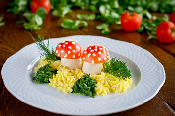 funny meal for kids, chicken and tomato with mashed potatoes, fresh vegetables
