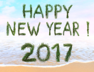 2017 Happy New Year. Holidays.Celebration. All letters and numbers are made of christmas tree branches. Sea surf. Magic seaside blur background