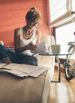 Woman at home working on script