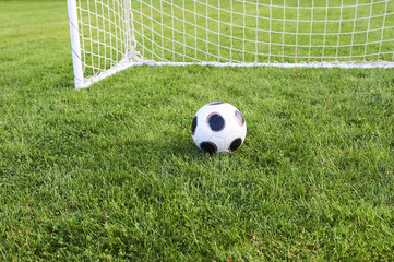 Classical football on the soocer field - playground