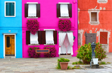 Venice, Burano: the small yard with bright walls of houses