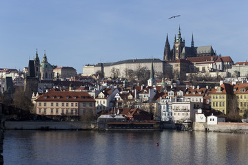 Autumn Lesser Town of Prague with gothic Castle above River Vltava, Czech Republic