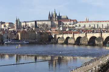 Autumn Lesser Town of Prague with gothic Castle and Charles Bridge, Czech Republic