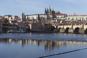 Autumn Lesser Town of Prague with gothic Castle and Charles Bridge, Czech Republic
