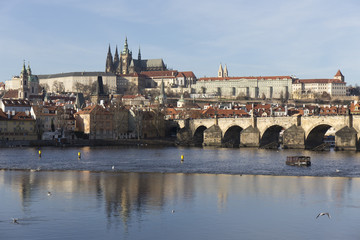 Autumn Lesser Town of Prague with gothic Castle and Charles Bridge, Czech Republic