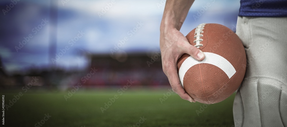 Poster Composite image of close-up of sports player holding ball