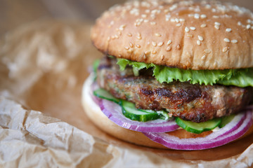 Classic american burgers, fast food on wood background