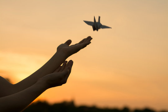 Human hands open palm up.Silhouette of one helping hand,Silhouette of woman praying over beautiful sky background,Silhouette of pigeon and freedom,