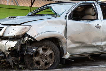 Fototapeta premium .Front tire and wrecked cars.