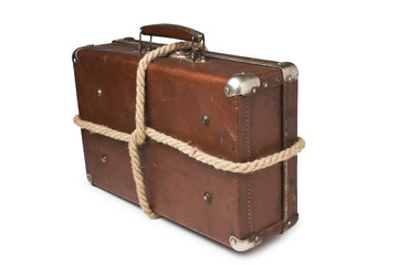 old suitcases tied with rope