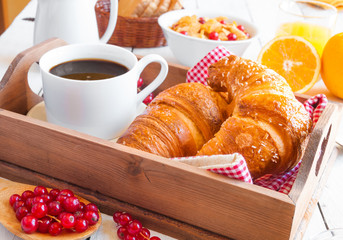 Breakfast on wooden tray