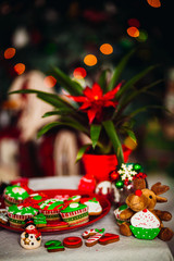 The cakes,deer and snowman stand on the table