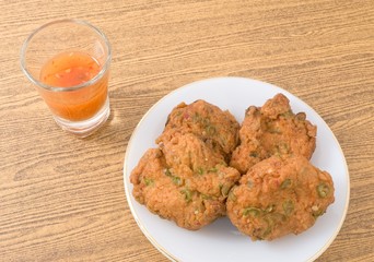 Thai Fish Cakes Served on A White Plate