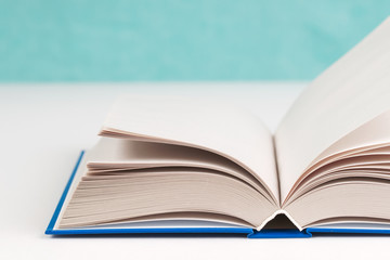 Open book on table. Back to school. Copy space