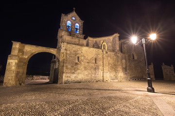 night scene of Church San Vicente Martir and San Sebastian in Frias, Burgos, Spain.