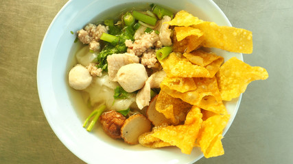 Thai noodle fish and pork soup
