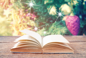 Open book with Christmas background