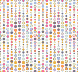 Vintage geometric seamless pattern on a white background. It consists of colored circles of different sizes. Useful as design element for texture and artistic compositions.