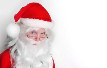 Santa Claus face on white background. Picture for christmas greeting card or gift label.