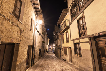 Night photography of Alley in the medieval village of Frias, Burgos, Spain.