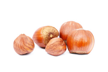 Group healty hazelnuts isolated on white background