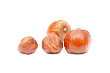 Group healty hazelnuts isolated on white background