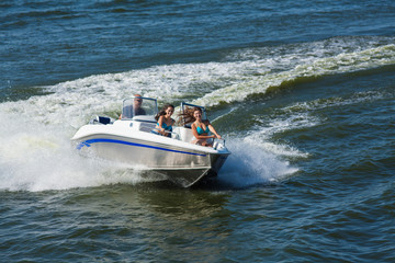  Girls ride on the boat to drift