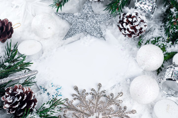 Christmas card with decorated fir tree on snow.