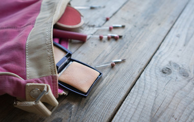 Fototapeta na wymiar Bag with a set of cosmetic accessories