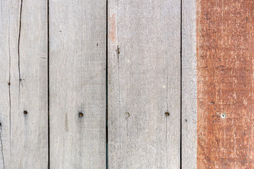 The pattern of the wooden wall texture.