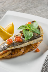 Sea bass fillet with vegetables