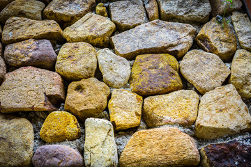 The stones wall texture. The wall made by stone.