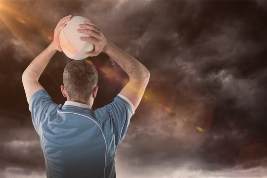 Composite image of rugby player throwing a rugby ball 3D