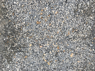 The area is filled with small stones