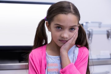 Unhappy young patient having a toothache