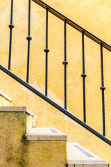 The Staircase with iron railings. Staircase texture.