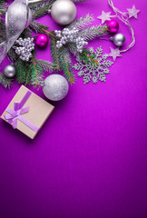 Purple Christmas background with a present