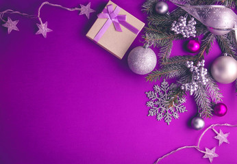 Purple Christmas background with a present