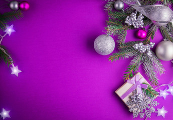 Purple Christmas background with a present