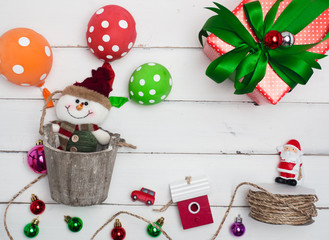 Christmas decoration on color background . Red and gift box and decorate ball .top view composition.