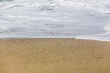 Waves breaking on the shore