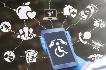 Medical health care invalid wheelchair insurance security tablet computer concept. Doctor holding tablet with hands disabled icon. Medicine assurance healthcare delivery treatment internet technology