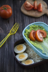 
healthy food in the container - rice, eggs, vegetables