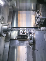 High precision CNC machining center working, operator machining