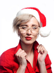 Woman wearing glasses and a christmas cap.