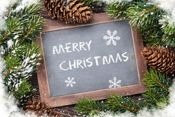 Christmas chalkboard and fir tree