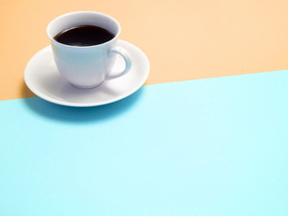 Obraz na płótnie Canvas Top view of colorful cup of coffee and glasses on color background for create idea for business or design .Relax coffee time (flat lay)