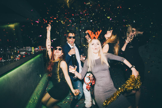 Group Of Friends Entering The Club And Having Fun. New Year's Party 